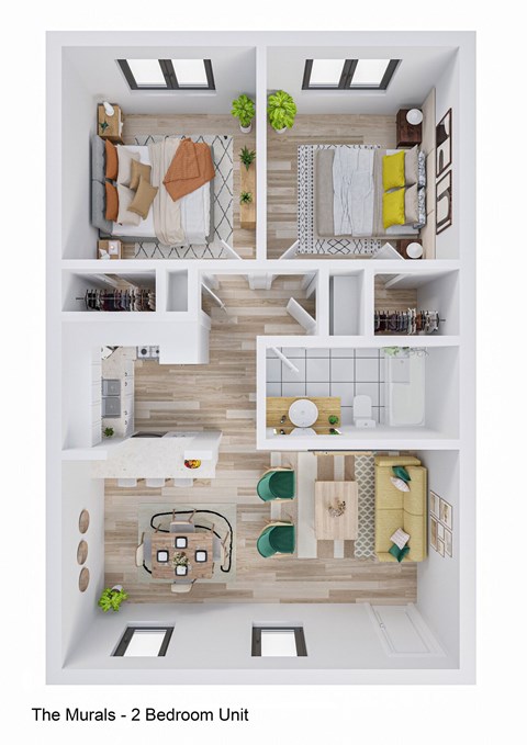 A top-down view of a bedroom unit with a bed, desk, and chair.